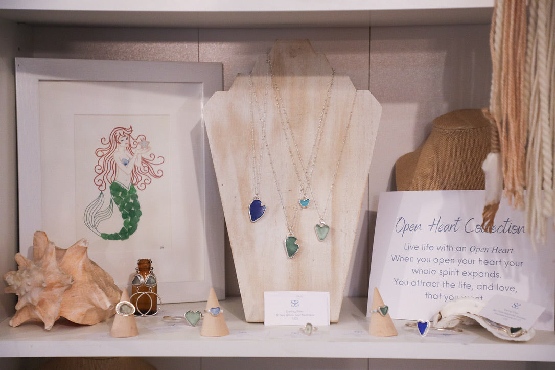 retail display of wholesale sea glass jewelry from Sea Glass & Sunsets