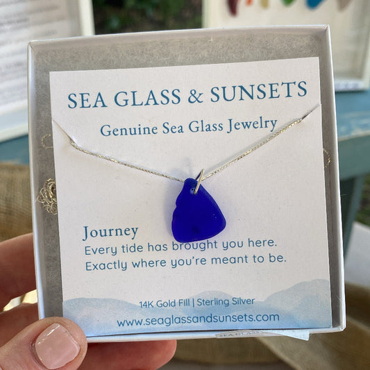 Cobalt Blue Sea glass necklace in a jewelry box with meaningful insert card