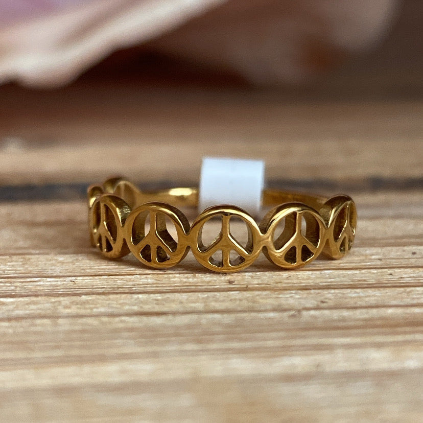 Gold peace sign ring