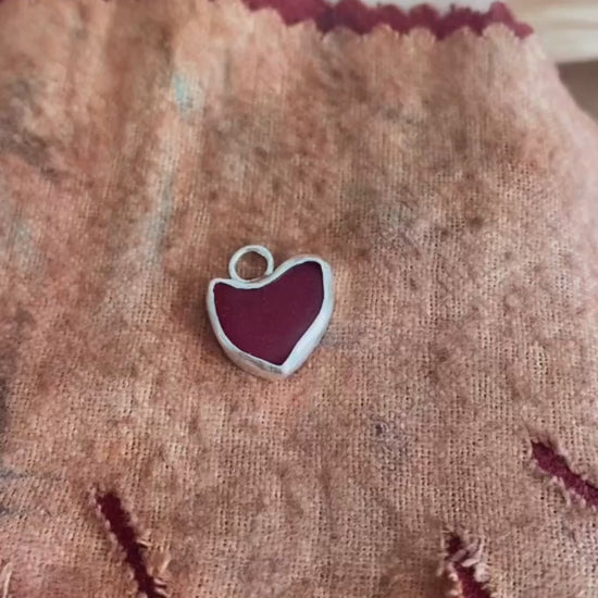bezel set red sea glass heart