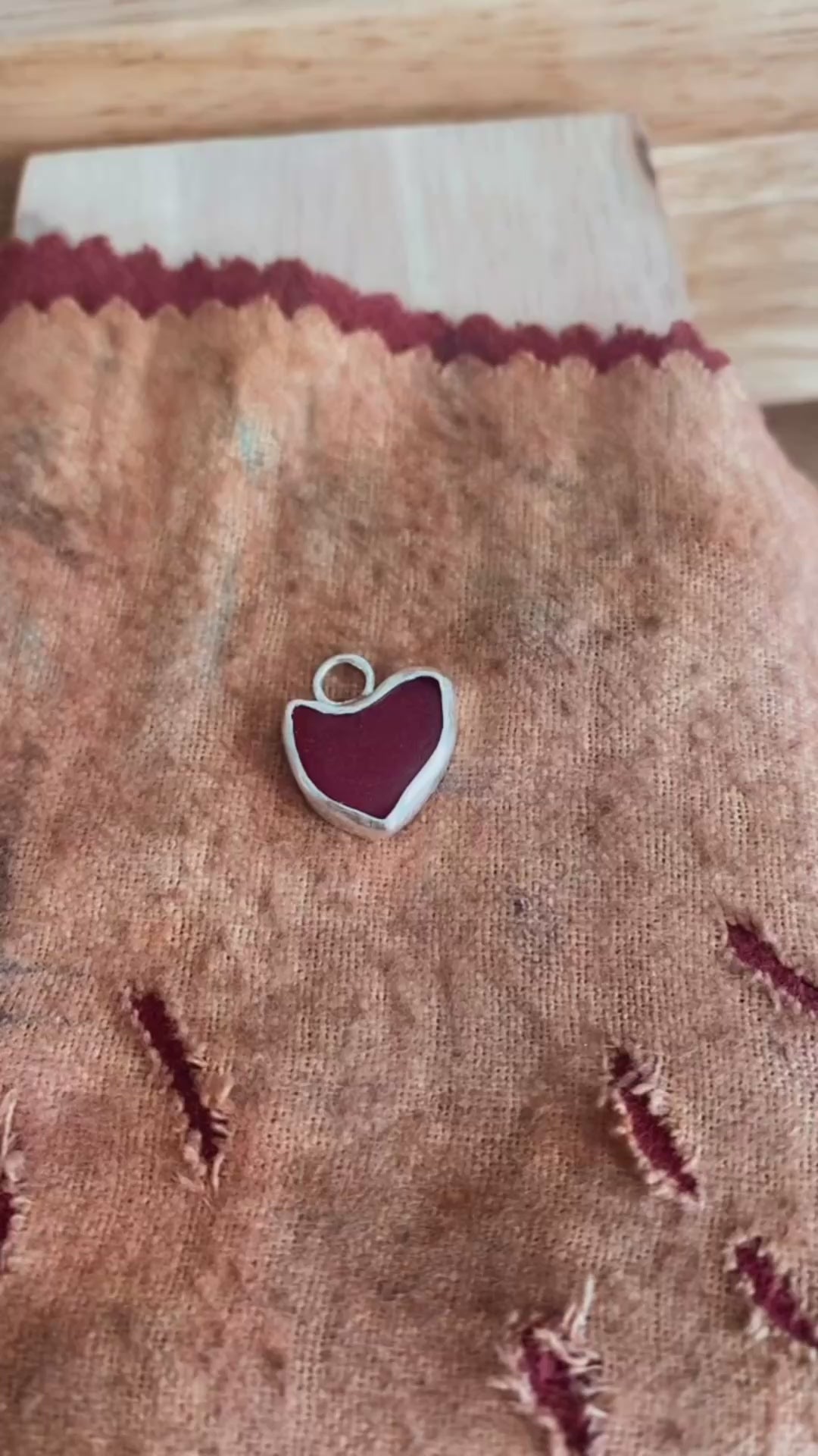 bezel set red sea glass heart